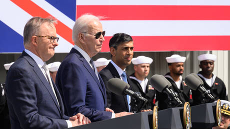 Australian Prime Minister Anthony Albanese (L), US President Joe Biden (C) and British Prime Minister Rishi Sunak (R) hold a press conference after a trilateral meeting during the AUKUS summit on March 13, 2023 in San Diego, California