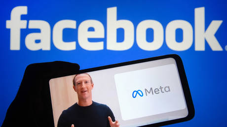 In this photo illustration, Facebook CEO Mark Zuckerberg is seen on a video displayed on a smartphone screen as he announces the new name for Facebook: Meta