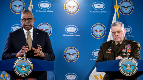 US Secretary of Defense Lloyd Austin and Chairman of the Joint Chiefs General Mark Milley address reporters at the Pentagon, March 15, 2023.