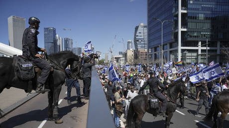 Mounted policemen block a protest march in Tel Aviv, Israel, March 16, 2023