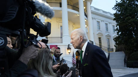 President Joe Biden talks to reporters before departing from the South Lawn of the White House, in Washington, DC, March 17, 2023.