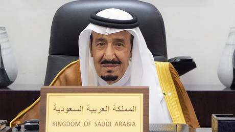 King Salman attends the G20 Leaders' Summit via videoconference at the royal palace in Riyadh, Saudi Arabia, October 30, 2021