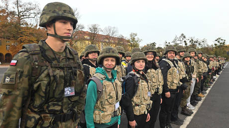 FILE PHOTO. Participants are seen during the 'Train With The Army' event at the Land Forces Academy in Wroclaw, Poland.