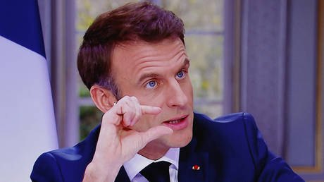 French President Emmanuel Macron speaks during a TV interview from the Elysee Palace, in Paris, on March 22, 2023.