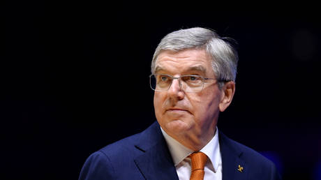 Thomas Bach, President of the IOC, at the medal ceremony for Men's All-Around Final at the 2022 Gymnastics World Championships on November 4, 2022 in Liverpool, England