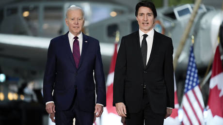 President Joe Biden and Canadian Prime Minister Justin Trudeau are seen at a gala dinner in Ottawa, Canada, March 24, 2023.