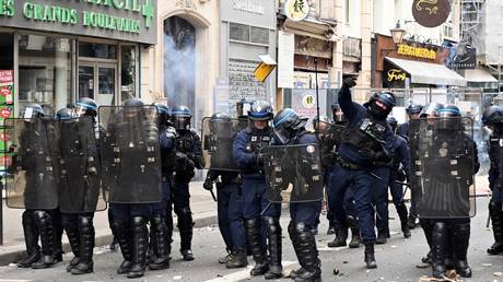Riot police officers clash with demonstrators during a rally in Paris, France, March 23, 2023