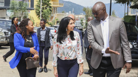 British Home Secretary Suella Braverman (C) attends a Commonwealth event in Kigali, Rwanda on March 19, 2023.