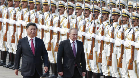 FILE PHOTO: Chinese President Xi Jinping and Russian President Vladimir Putin.