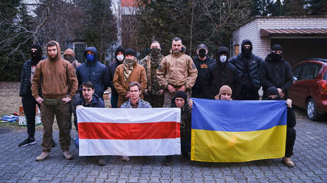 FILE PHOTO: Belarusian fighters in Poland before going to fight for Ukraine.