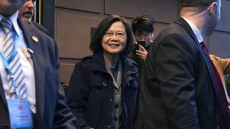 Tsai Ing-wen leaves a hotel in New York, Wednesday, March 29, 2023.