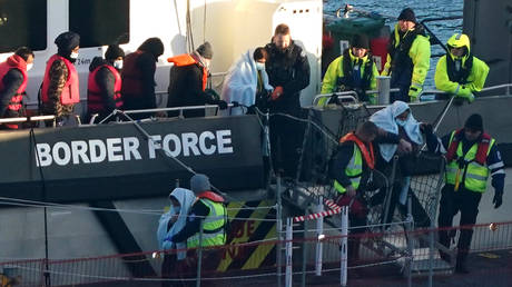 A group of people thought to be migrants are brought in to Dover, Kent, onboard a Border Force vessel, following a small boat incident in the Channel on February 7, 2023