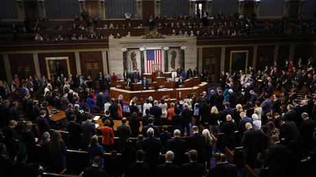 FILE PHOTO. Members of the 118th Congress stand for the Pledge of Allegiance on the first day of the 118th Congress in the House Chamber of the U.S. Capitol Building on January 03, 2023 in Washington, DC.