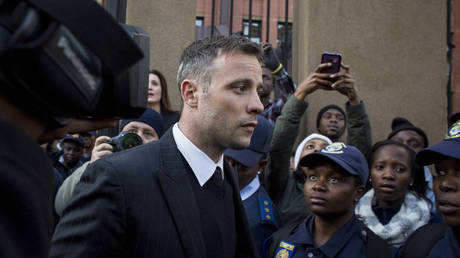 Oscar Pistorius leaves the North Gauteng High Court at the end of the third day of his resentencing hearing at Pretoria High Court on June 15, 2016 in Pretoria, South Africa