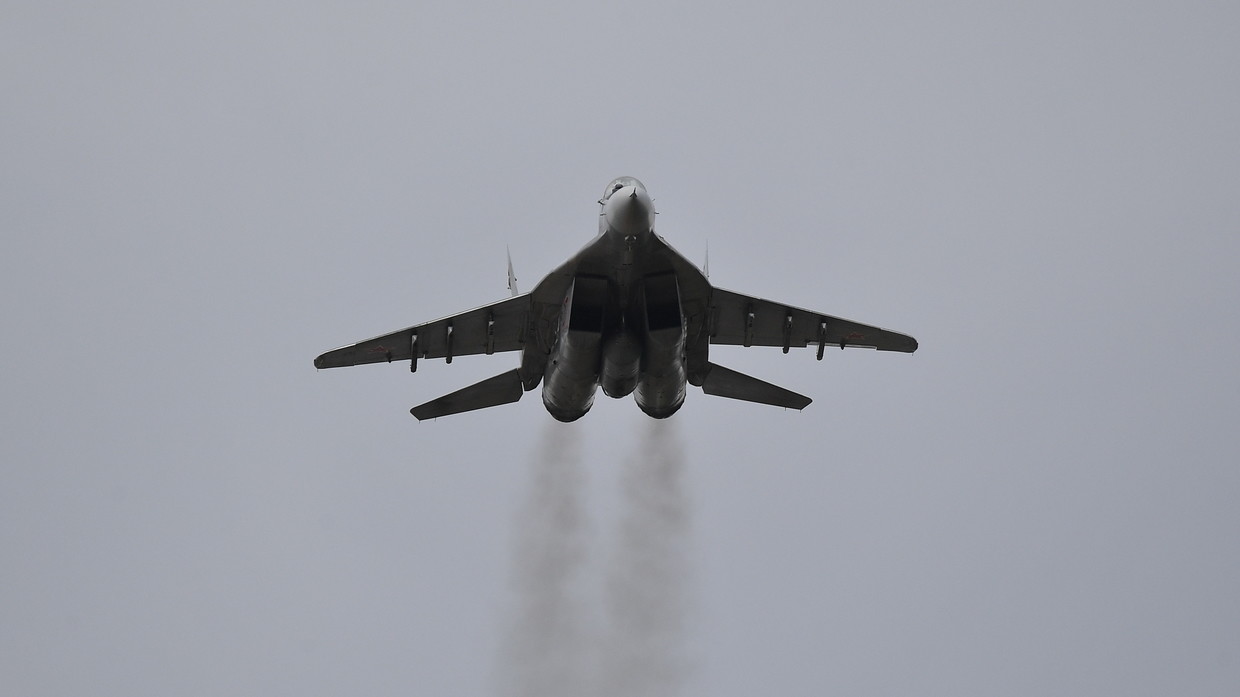 A MiG-29 jet fighter in the air.