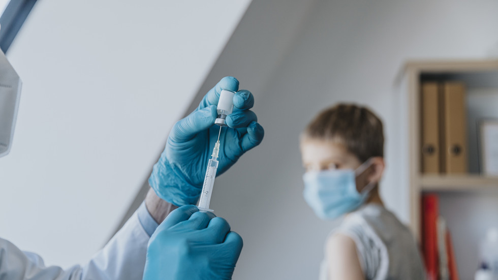 US settles Covid vaccine injury claims — RT World News