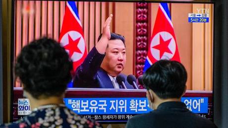 File footage of North Korean leader Kim Jong Un is shown on a television screen at a train station in Seoul on Septeber 9, 2022.