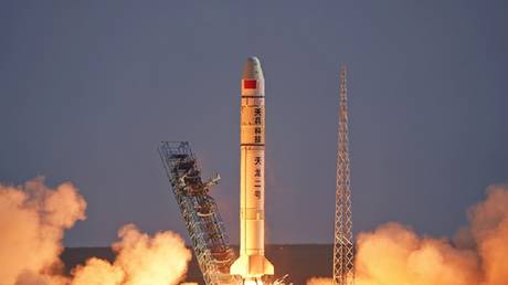 China hits space milestone