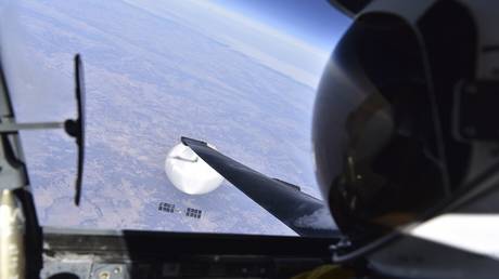 A US Air Force pilot looks down at a suspected Chinese surveillance balloon.