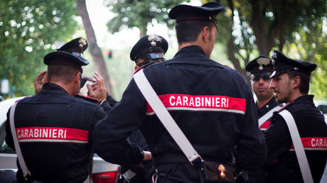 File photo: Italian Carabinieri officers in full uniform chatting in central Rome.