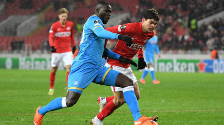 FILE PHOTO. Napoli's Senegalese defender Kalidou Koulibaly and Spartak Moscow's Brazilian defender Ayrton vie for the ball during the UEFA Europa League football match between Spartak Moscow and Napoli at Moscow's Spartak Stadium on November 24, 2021.