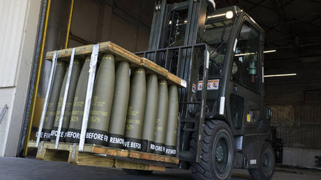 FILE PHOTO. A forklift at the Dover Air Force Base in Delaware moves 155 mm shells to be delivered to Ukraine, April 29, 2022.