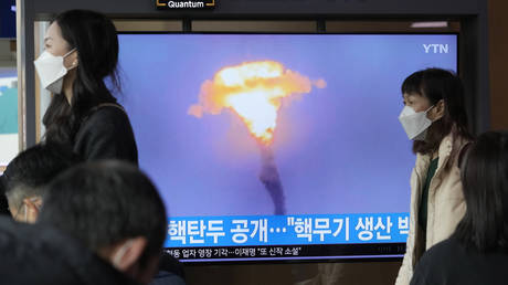 FILE PHOTO: A TV screen shows an image of a North Korean missile launch during a news program at the Seoul Railway Station in Seoul, South Korea, March 28, 2023.