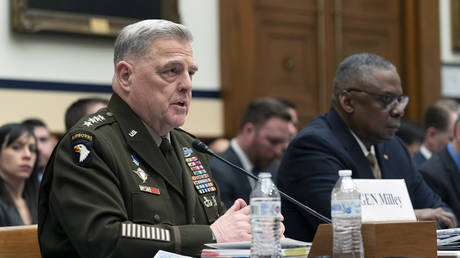 Chairman of the Joint Chiefs of Staff Gen. Mark Milley (L) testifies before the House Armed Services Committee on Capitol Hill in Washington, DC, March 29, 2023.