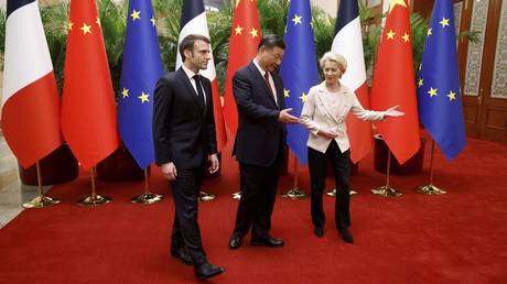 China's President Xi Jinping, center, his French counterpart Emmanuel Macron, left, and European Commission President Ursula von der Leyen meet for a working session in Beijing Thursday, April 6, 2023.