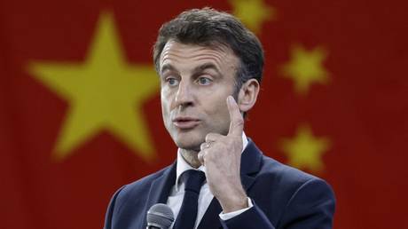 Emmanuel Macron gestures as he speaks to students at Sun Yat-sen University in Guangzhou, China, April 7, 2023