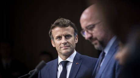 FILE PHOTO: French President Emmanuel Macron (L) and President of the European Council Charles Michel (R).