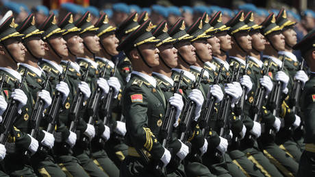 China expands military draft to veterans and students