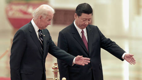 FILE HOTO: Joe Biden and Xi Jinping.