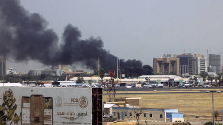 Smoke rising above buildings during armed clashes in Khartoum, Sudan, April 15, 2023.