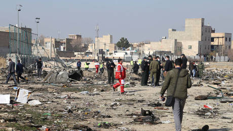 FILE PHOTO: Search and rescue works are conducted at a Ukrainian Boeing 737 crash site near Tehran, Iran, on Januray 8, 2020.