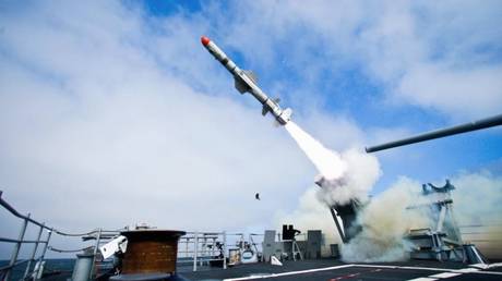 FILE PHOTO: A US Navy cruiser launches a Block II Harpoon missile in the Naval Air Systems Command Sea Test Range off the coast of southern California.