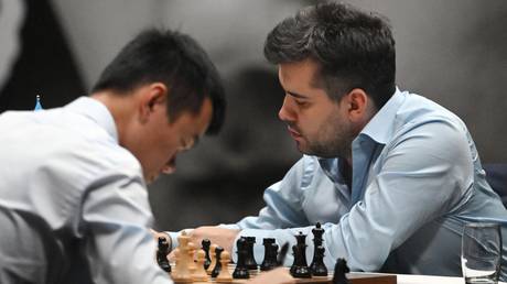 China's Ding Liren and Russia's Ian Nepomniachtchi compete in the fourth game of the 2023 FIDE World Chess Championship Match in Astana, Kazakhstan.