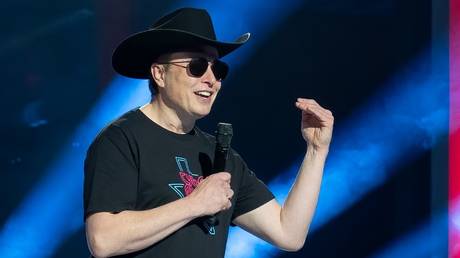 Elon Musk speaks at a Tesla manufacturing plant opening party in Austin, Texas, April 7, 2022