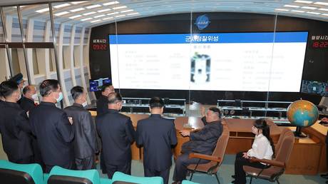 North Korean leader Kim Jong-un (2nd from R) and his daughter, Ju-ae, visit the DPRK's space development agency, April 18, 2023.