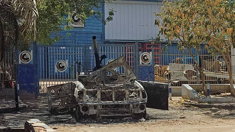 This picture shows a destroyed vehicle of the Rapid Support Forces (RSF) paramilitaries in southern Khartoum on April 19, 2023 amid fighting between Sudan's regular army and paramilitaries following the collapse of a 24-hour truce.