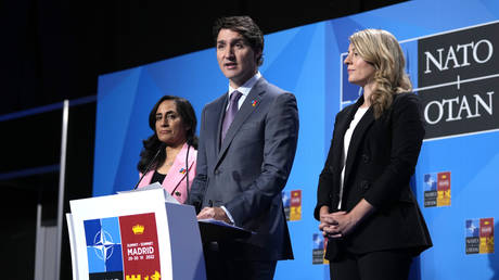 FILE PHOTO: Canadian Prime Minister Justin Trudeau speaks during a media conference at a NATO summit in Madrid, Spain, June 30, 2022.