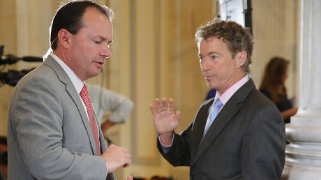 US Senators Mike Lee (left) and Rand Paul are among 19 Republican lawmakers calling to end "unrestrained" aid to Ukraine.