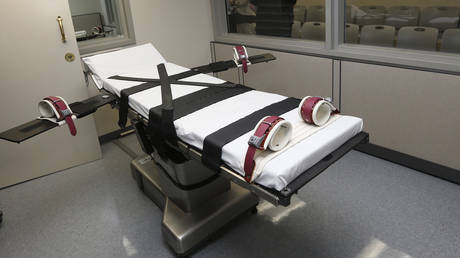 FILE PHOTO: A gurney is seen in the execution chamber at the Oklahoma State Penitentiary in McAlester, Oklahoma.