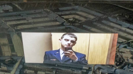 Photo illustration shows the suspected leaker Jack Teixeira, reflected in an image of the Pentagon in Washington, DC.
