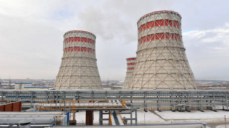 FILE PHOTO: Cooling towers of the Fortum's power units in Chelyabinsk, Russia