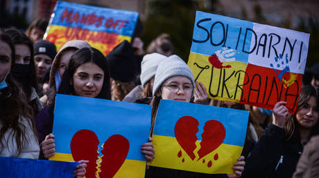 File photo: Polish schoolchildren hold banners and flags during a rally for Ukraine on March 01, 2022 in Przemysl.
