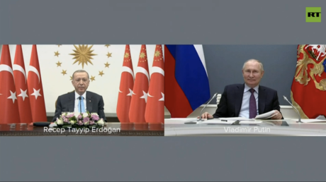 Tukrish President REcep Tayyip Erdogan (L) and Russian President Vladimir Putin (R) take part in a fuel delivery ceremony at the Akkuyu nuclear power plant in Türkiye via a video link, on April 27, 2023.