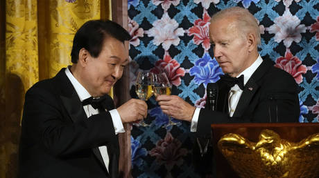 President Joe Biden toasts with South Korean President Yoon Suk-yeol during a state dinner at the White House in Washington, DC, April 26, 2023.