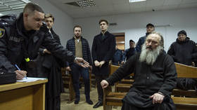 Ukrainian cops put ankle monitor on senior Orthodox bishop
