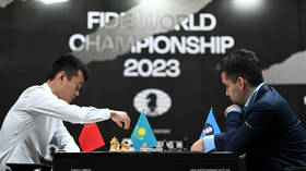 Russian draws first blood in world title match